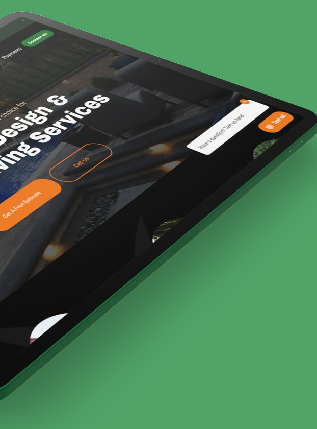 Executive Outdoor Living website shown on an angled tablet, call-to-action buttons and chat widget