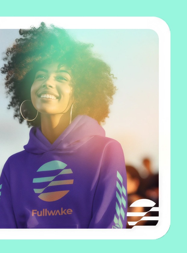 Model wearing a purple Fullwake hoodie at sunset
